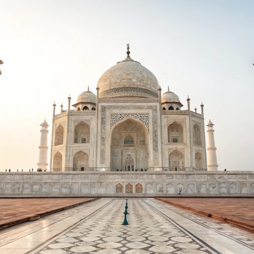 A white tiger stands proudly in a snowy winter landscape